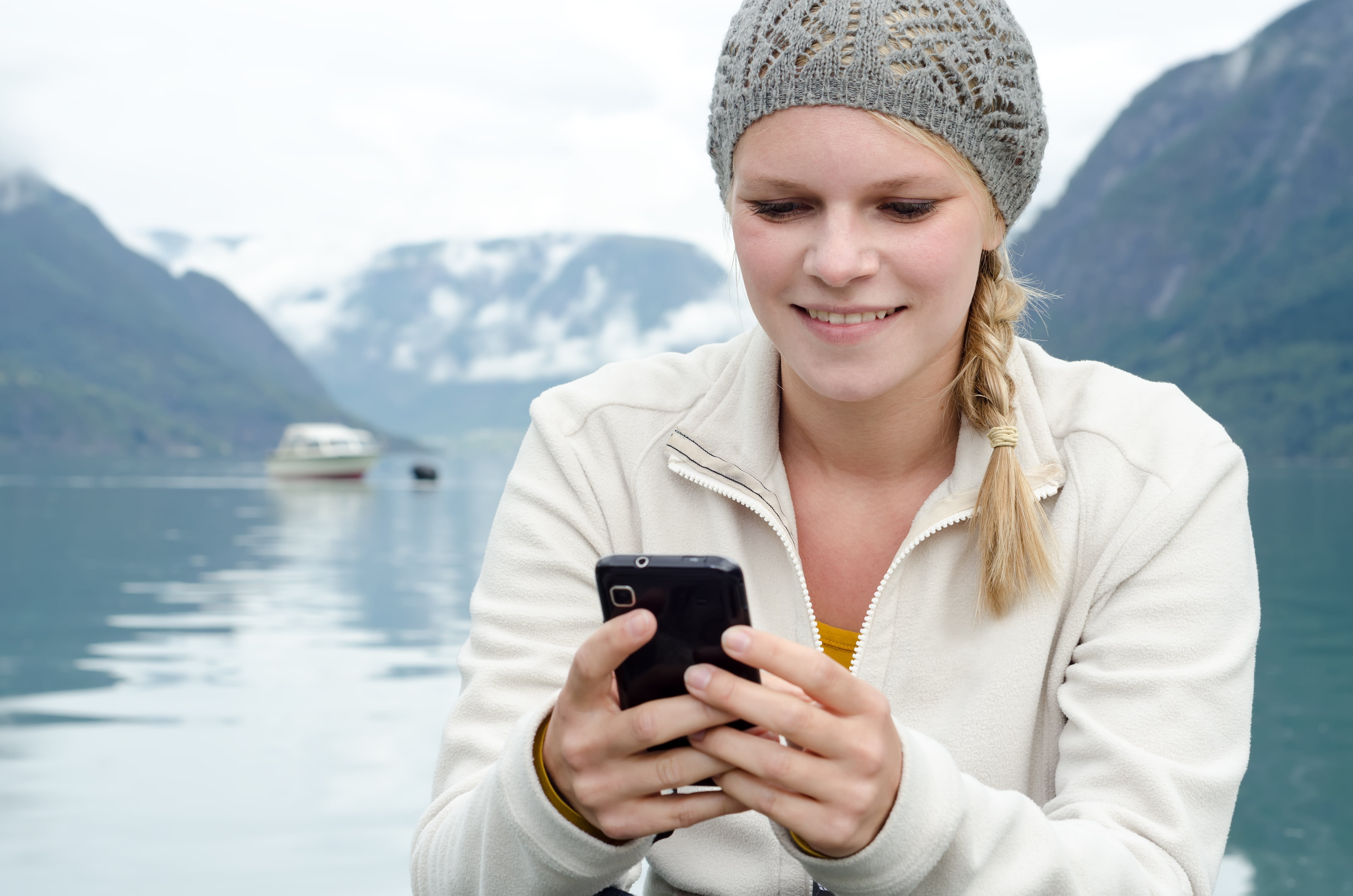 Dame med mobiltelefon